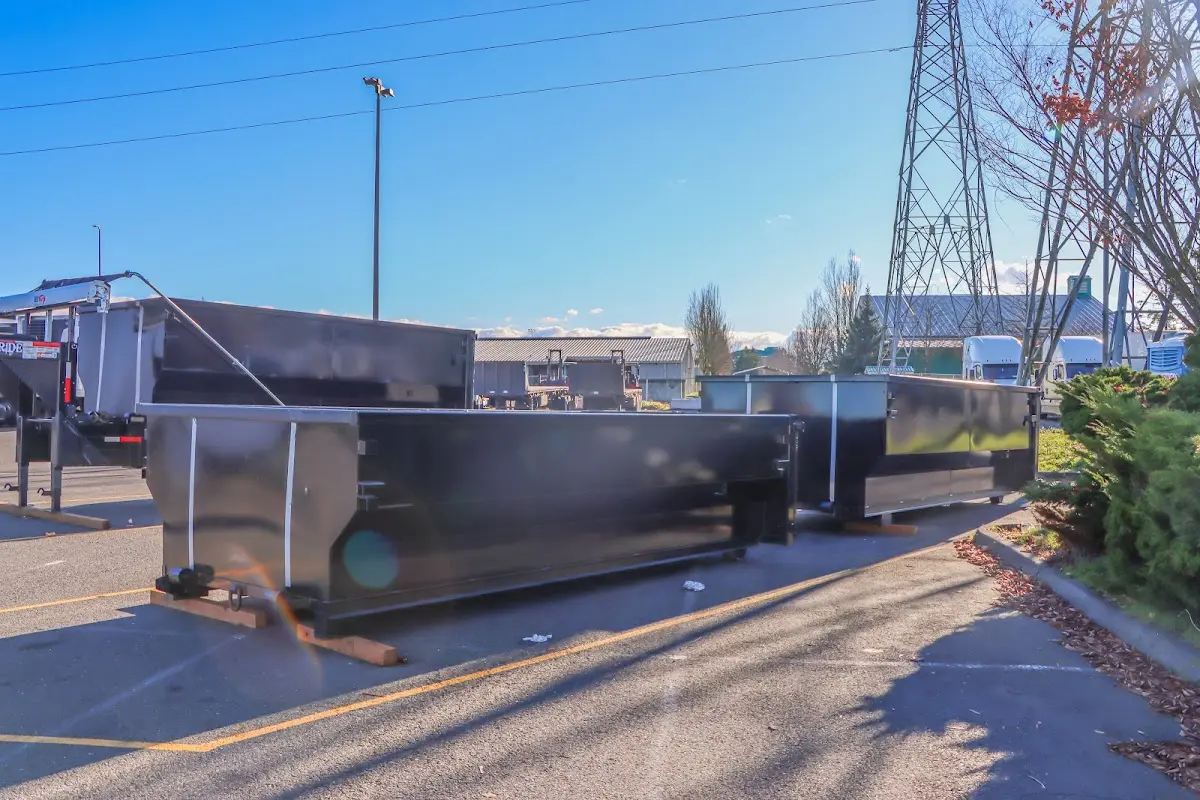 Roll-off dumpster ready for waste disposal at job site for 3 Yard Dumpster Rental in Danbury